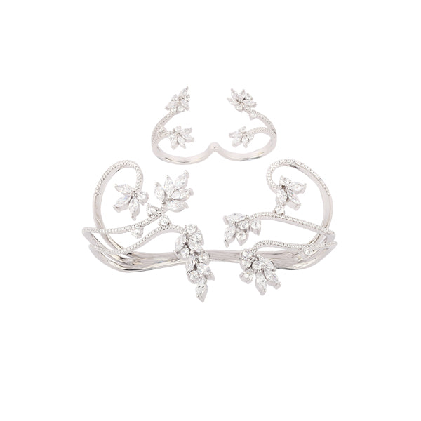 Intertwining love and lust, decorate your delicate hands with this palm cuff and 2 finger ring crafted in crystals and set in the mixed metal alloy.
