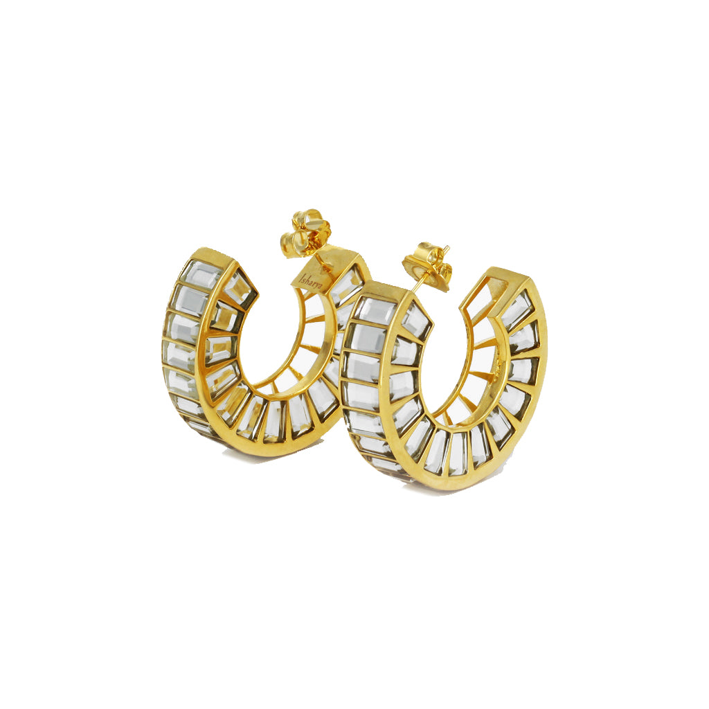 Two-toned and attention-seizing, our Isharya front hoop prism earrings are crafted in mirror and 18k gold-plated brass.
