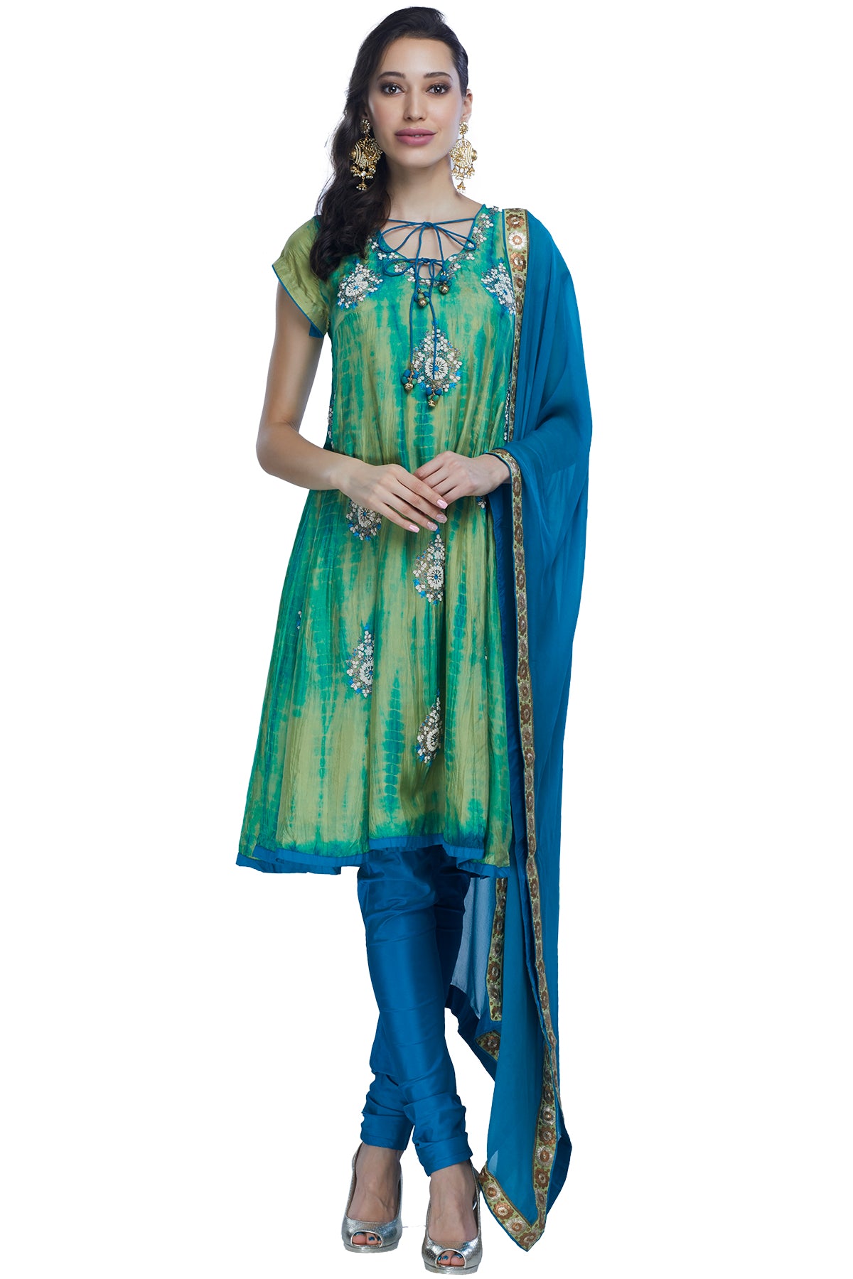 Your new staple for the upcoming festive season, this uplifting kurta churidar in the seizing hues of green and blue can be toned down for a pooja or toned up for a formal event. 
