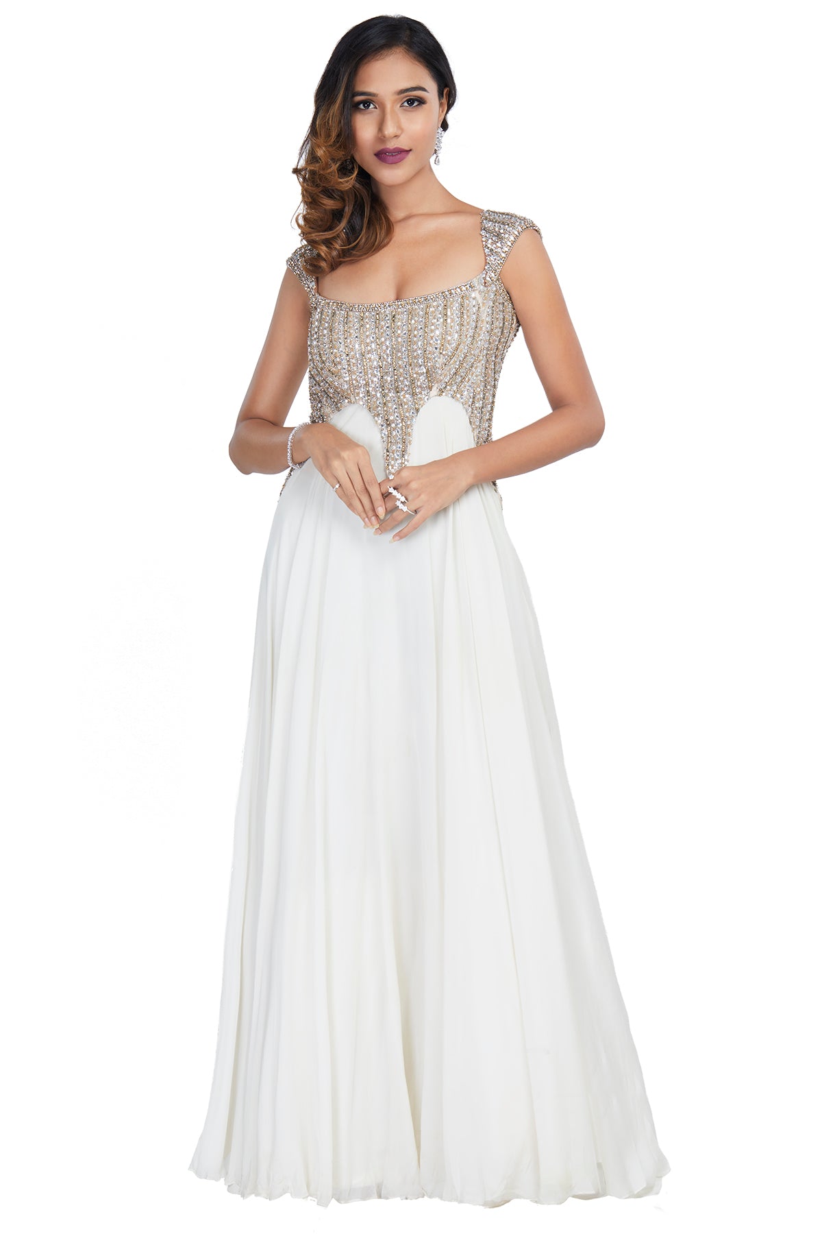 You cannot go unnoticed in this stunning deep neck, gold and white embellished gown with a sexy back!
