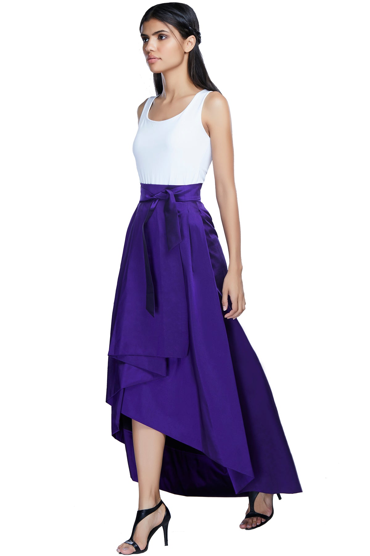 Tease your mood in this sometimes up, sometimes down purple hi-low skirt with a front bow and box pleats.
