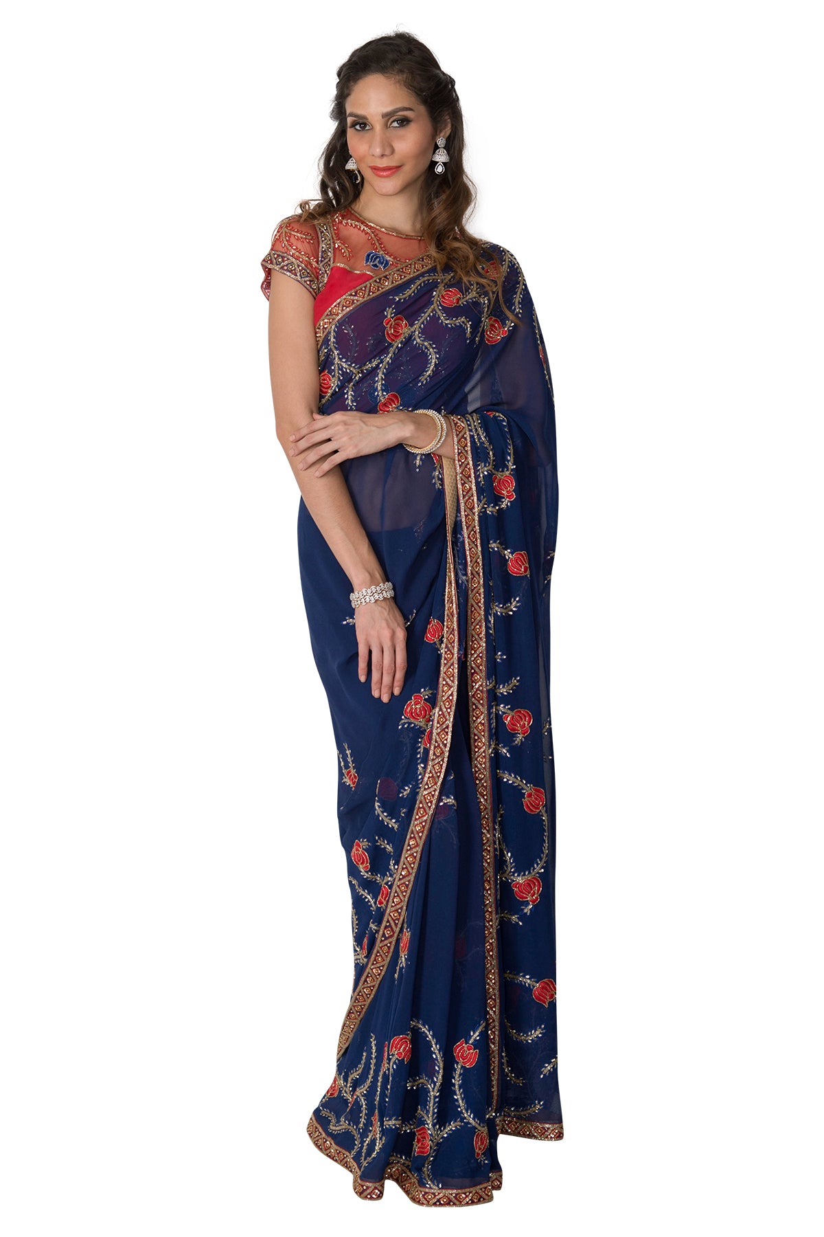 Bring on the moody blues and put on your dancing shoes in this stunning blue saree with red embroidery. Please note that the blouse and petticoat are not included.
