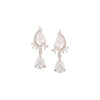These divine, dangling pieces are crafted with white crsystals with asymmetrical filigree and a large marquise stone set in mixed metal alloy with a silver finish. 