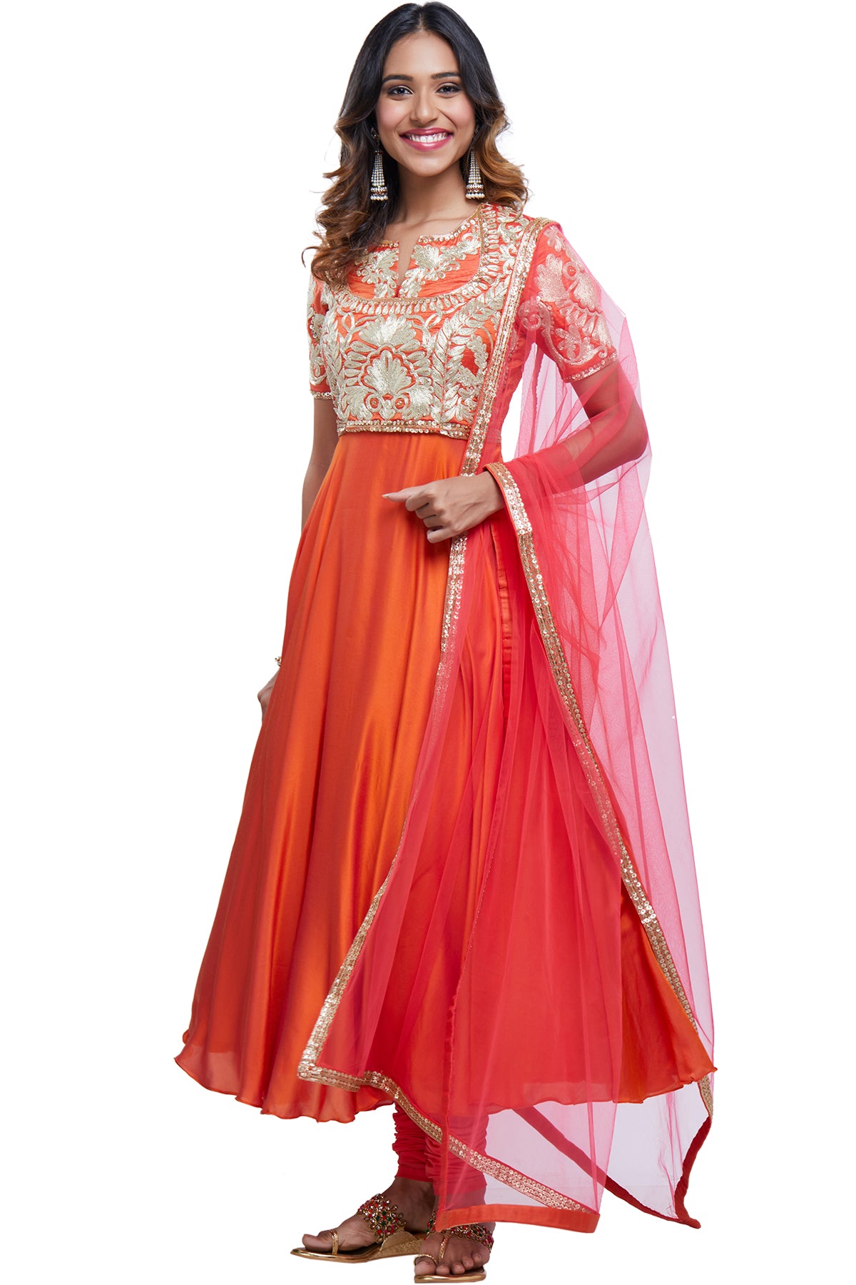 Orange silk anarkali embroidered with dori work on the bodice and net dupatta with its shine is set for you