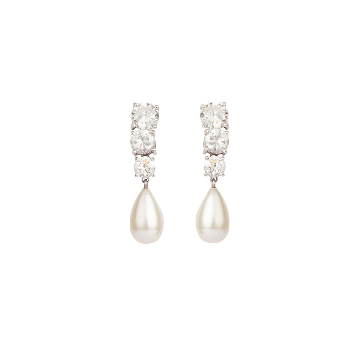 Studded with the shine of a thousand stars, these earrings are made of three solitaires of descending size finished with a perfect pearl drop set in silver.