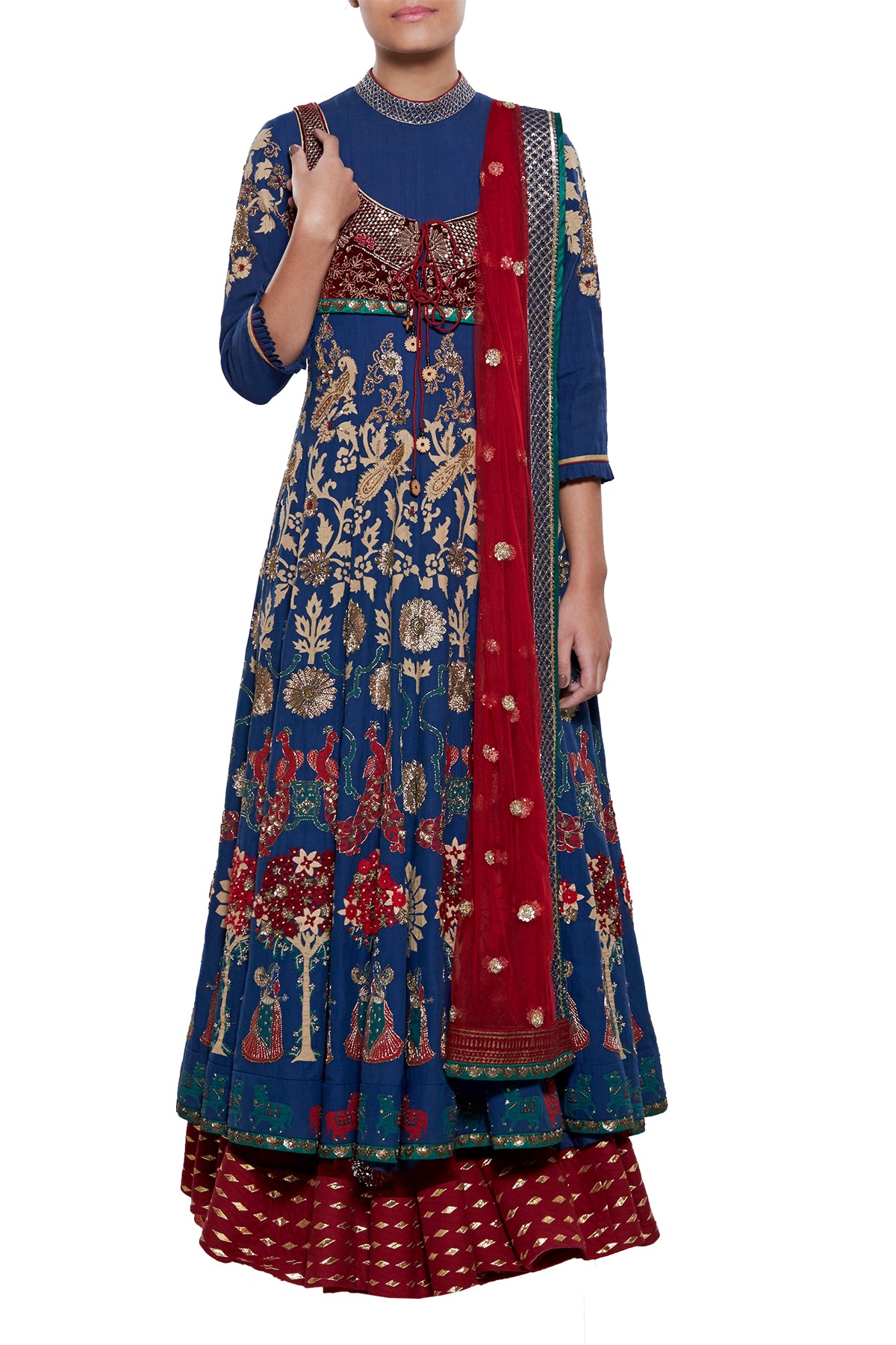 Reeking of royalty in a riveting blue & maroon medley, this gota lehenga skirt in net is paired to perfection with its appliqu‚Äö√†√∂‚àö√¢¬¨¬®¬¨¬© blue top. The ensemble is completed with its net embroidered dupatta and short zardosi jacket.