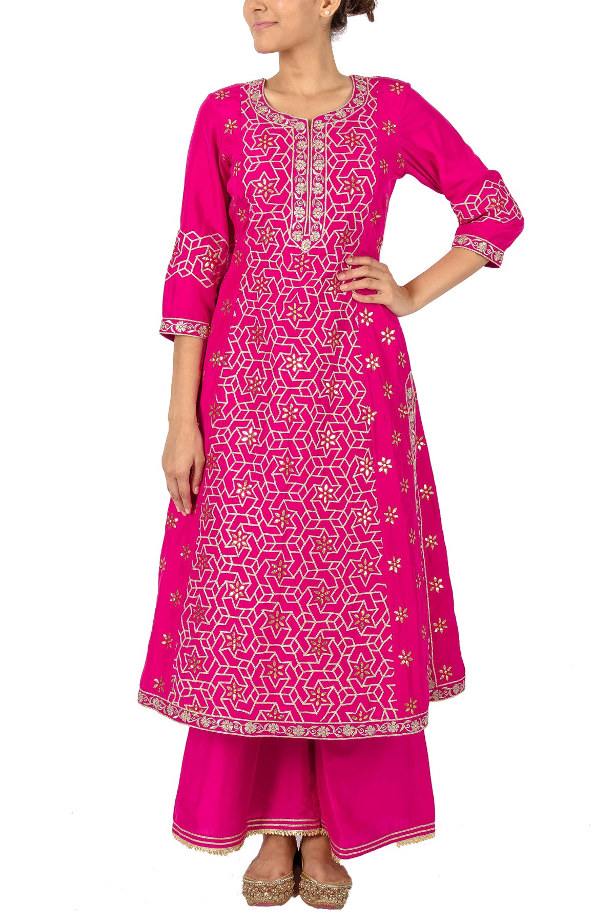 Step into a love triangle and square up your sense of style in this pink suit embroidered with geometric gota patterns. This is paired with embroidery palazzos and a matching dupatta.