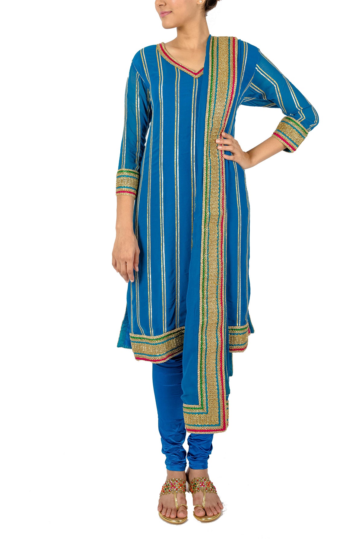 Your wardrobe staple be it a festive lunch, dinner, pooja, mehendi or even a wedding - this blue georgette kurta set has gold gota embroidery lifted with green and red.