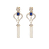 Soft as a subtle wind and sensational as the starry sky, these flawless earrings have white stones set in silver mixed metal with an emerald cut blue stone and dainty pearl danglers.