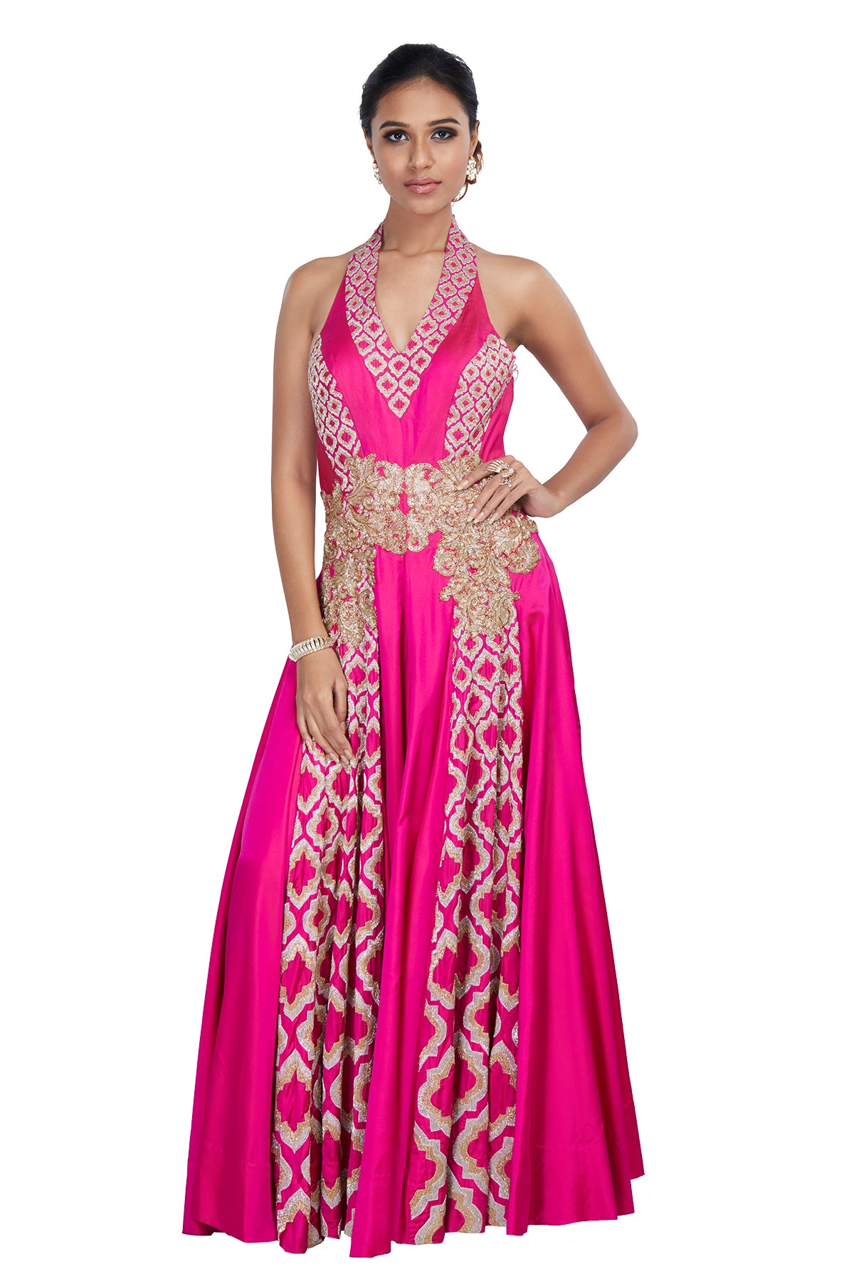 We pinky swear that this one's a keeper! Write your own Cinderella story in this pink halter two-tone silk & skin colour net down with gold & silver kardana embroidery. This one is weaved to entice wonder.