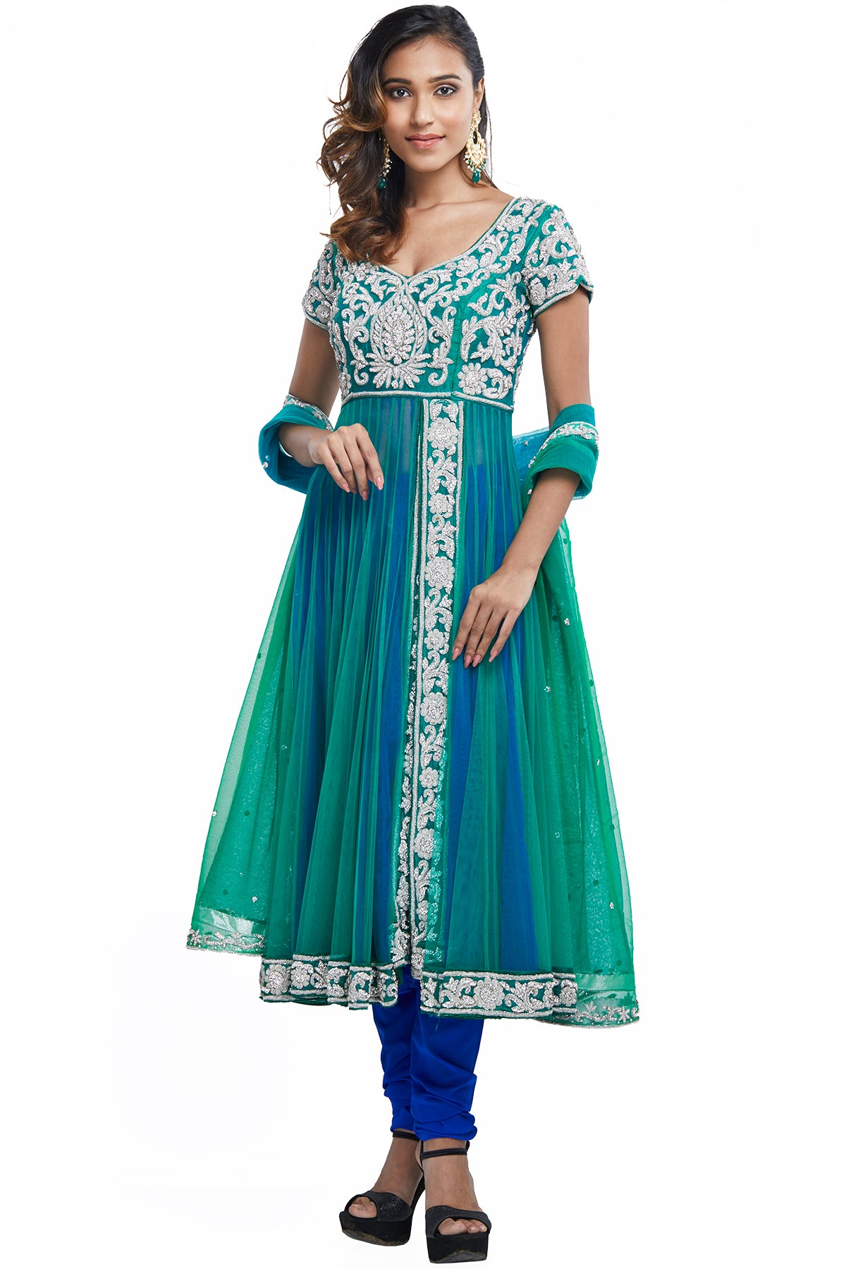 Why do boring when you can have twice the fashion in our double layered Anarkali tailored in the gorgeous silhouette of green & blue net. The zardosi embroidery and studded stonework make this fit for your every festivity.