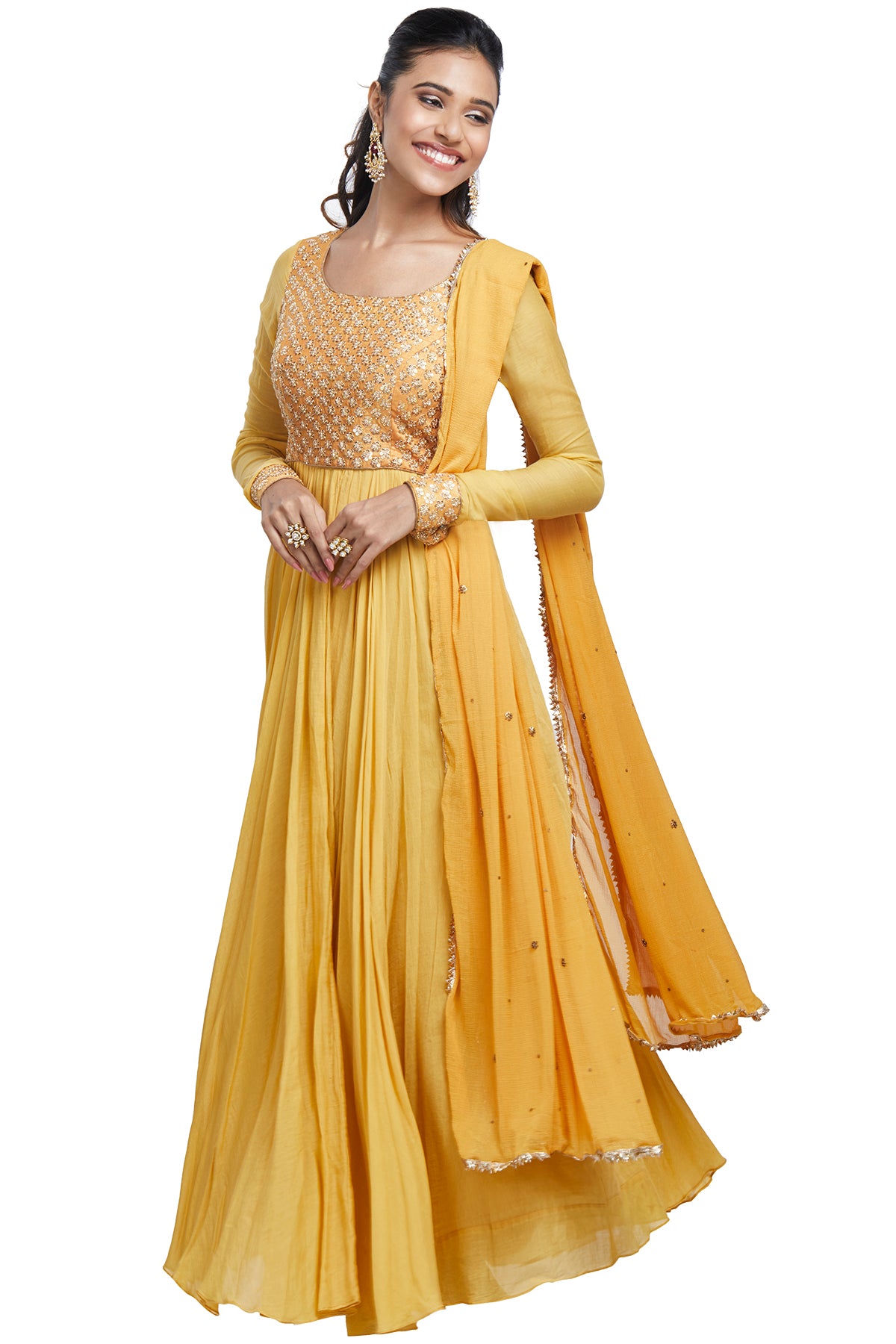 Have a fetish for sunshine and vibrant hues? Slip into our ochre yellow full-sleeved anarkali in chanderi finished with a sequin-embroidered bodice and georgette dupatta.