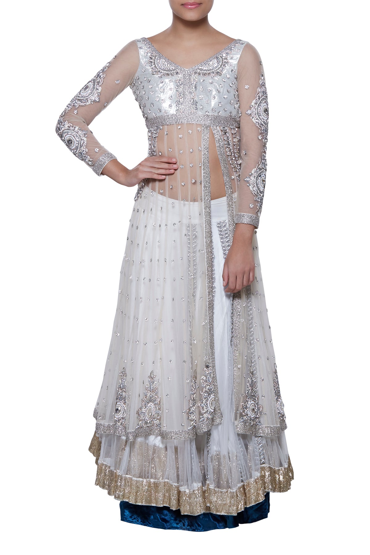 A subtle sensation for your next occasion - this piece has a white double layered lehenga with gota border and a full-sleeved net top with stone embroidery.