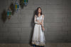 White Embroidered Long Top On Double Layered Lehenga