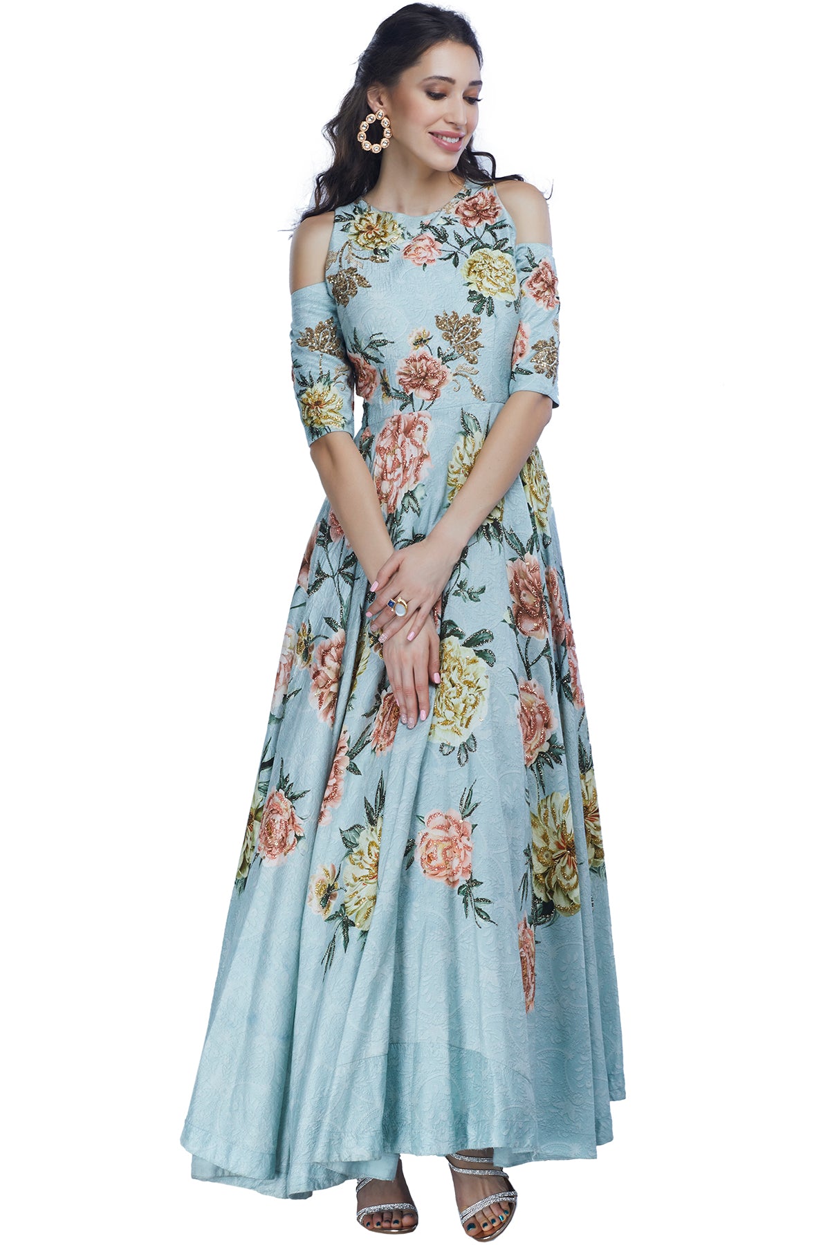 An edgy cut, a silhouette speaking the colours of the year and an indo-western edge makes this Kalista piece an absolute all-rounder! Retreat into a tropical oasis with its sky blue cold shoulder and all-over applique work.