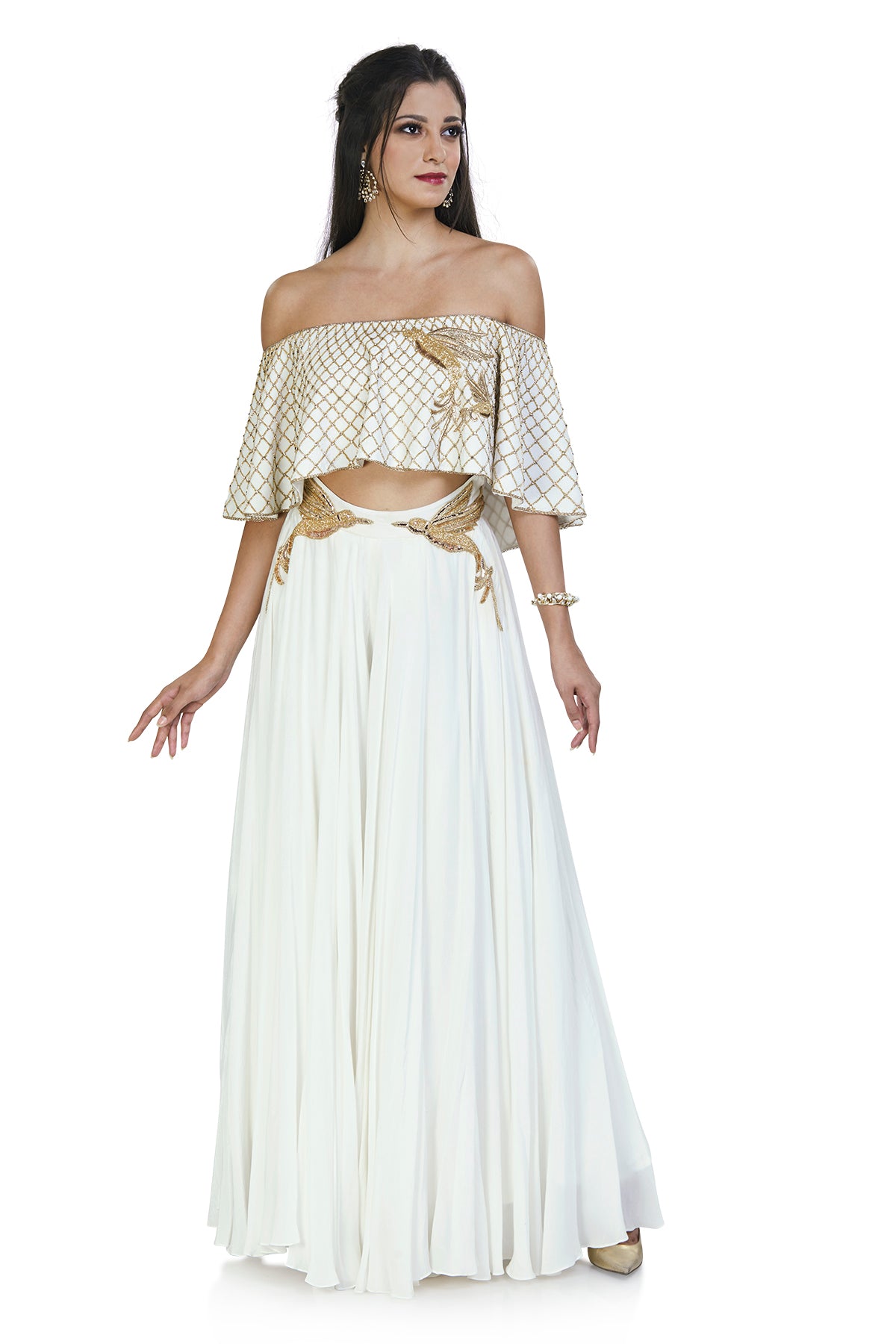 The georgette, floor-length free-flowing skirt and the off shoulder top adorned with delicate cutdana and sequins work with birds looks straight out of a dream.