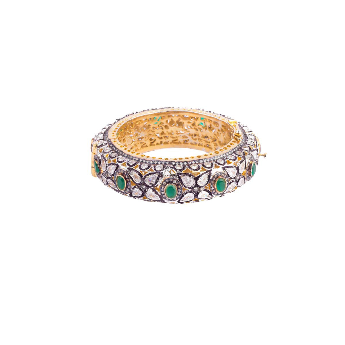 We're giving you some serious arm candy! This statement matte gold-finish bangle with rose cut crystals and green onyx stones is set in the mixed metal alloy.