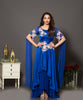 Royal blue cape sleeves layered gown in soft net and satin georgette. The multicolour floral embroidery is highlighted with silver cut-dana and sequins.