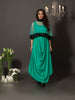 The beautiful cowl dress in soft mul is a versatile piece that can be worn with our without the cape. The cape is made of soft net with handcrafted floral thread embroidery at the bottom and is highlighted with sequins and pearls.