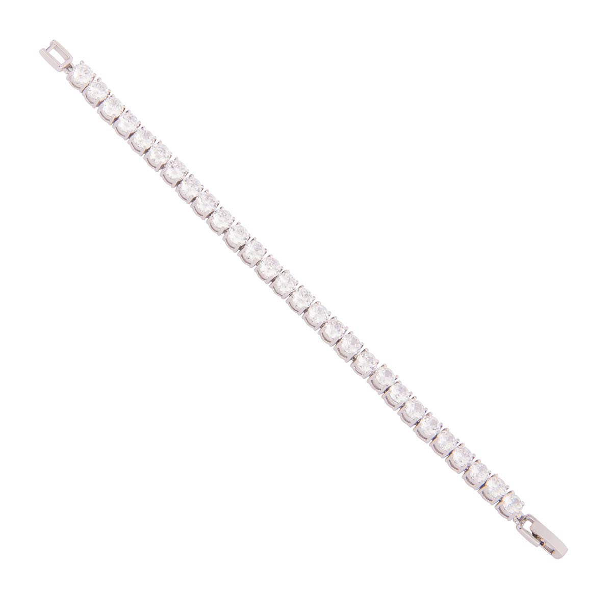 This single line bracelet of large crystals is the vision of all your dreams aligned in perfect harmony. The piece is set in mixed metal alloy with a silver finish.