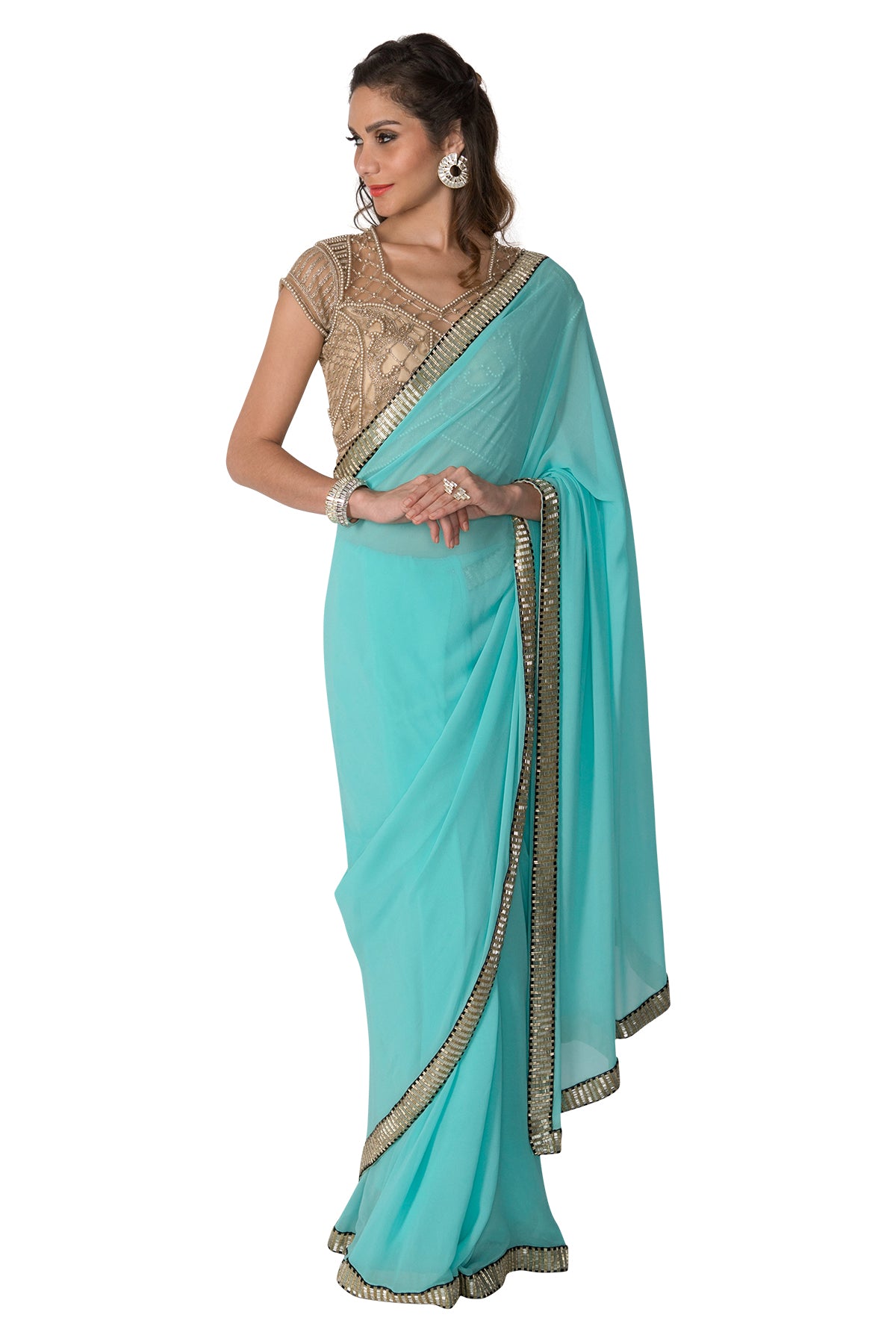 Soar into celebration-mode like a serene sight in this sky blue saree and gold blouse with delicate pearl work. Please note that the petticoat is not included.