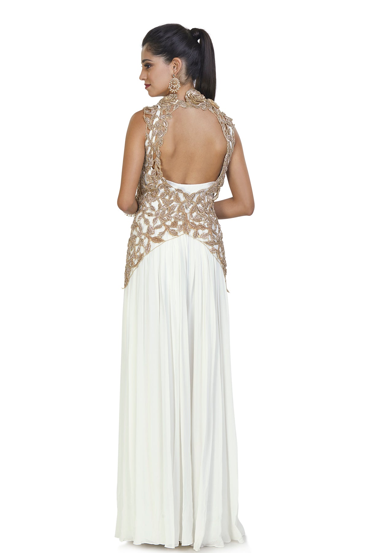 White jumpsuit with gold jacket