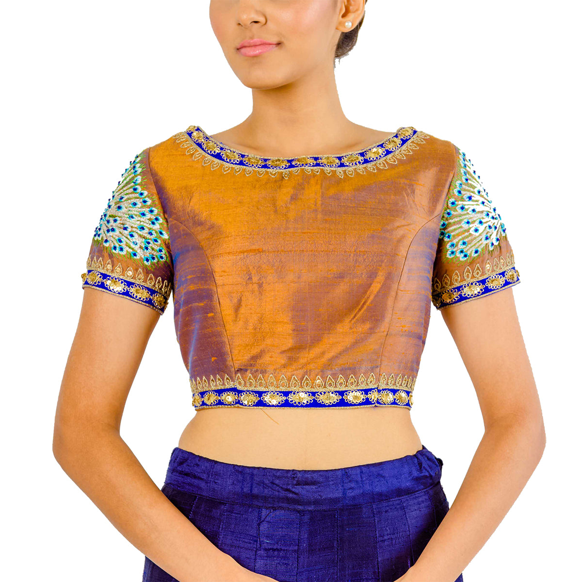 This piece brings back some serious pride and heritage with royal peacock motifs on the sleeves and back in a gold & blue two-toned silk material. 