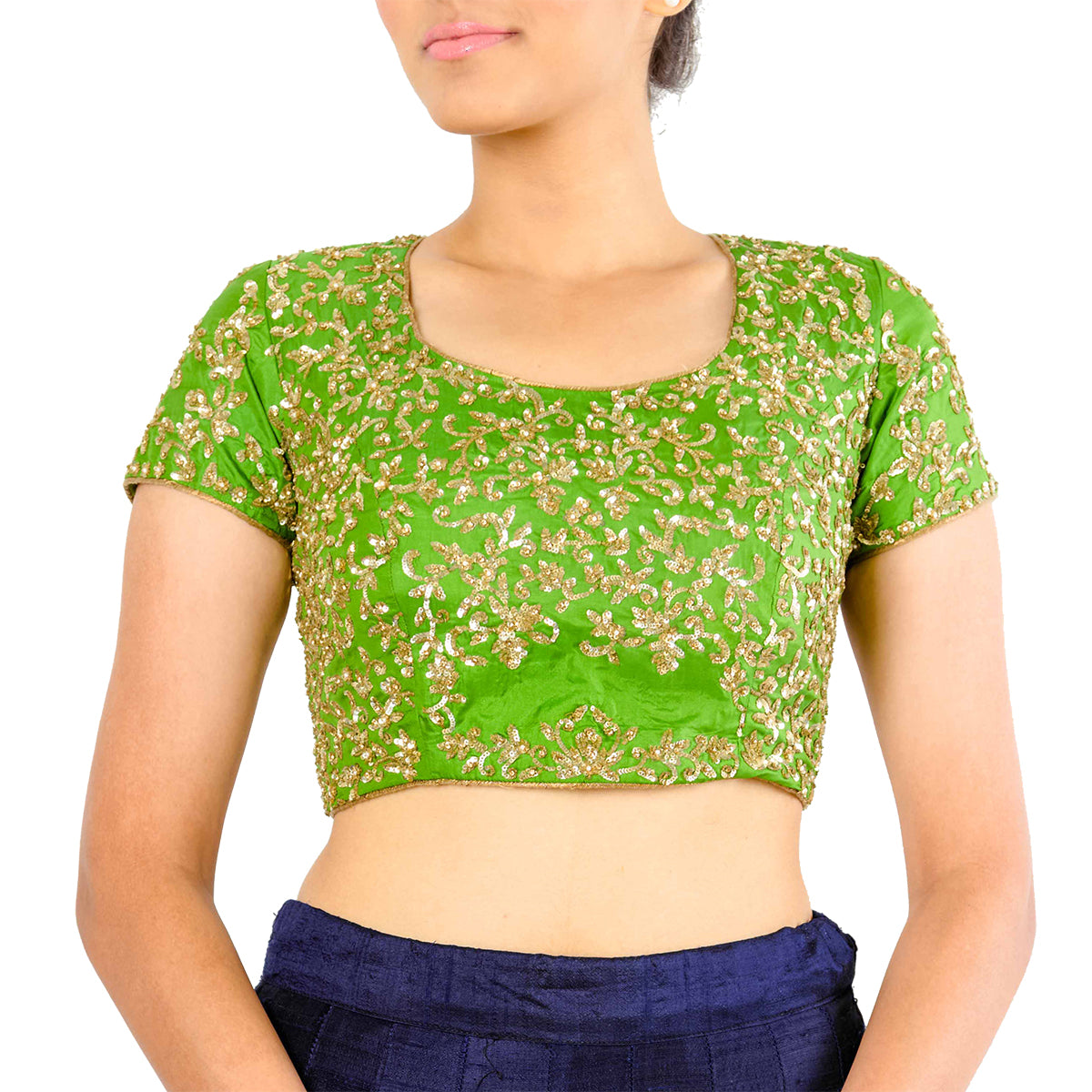 Stay endlessly allured with this all-time green blouse with gold embroidery - perfect for the day and bringing a colourful punch to the night. 