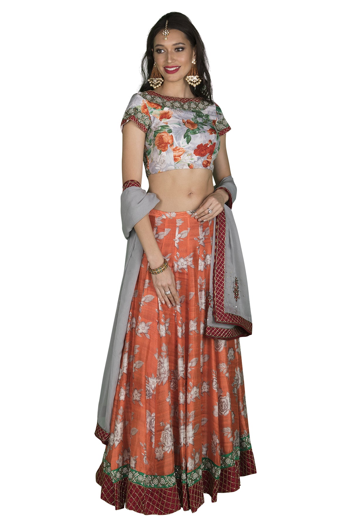 Grey blouse with pearl detailing and floral print. Orange skirt with red border.This outfit lets you stand out and gives you not only elegance but beauty as well. 
