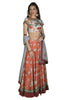 Grey blouse with pearl detailing and floral print. Orange skirt with red border.This outfit lets you stand out and gives you not only elegance but beauty as well. 
