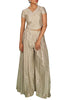 Play it cool as a new-age couture queen in these grey pleated palazzo pants paired with a loose crop top embroidered with a foiled pattern.
