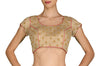 Raise the temperature in this light gold textured blouse highlighted with gold hand embroidered round motifs and dark pink piping.