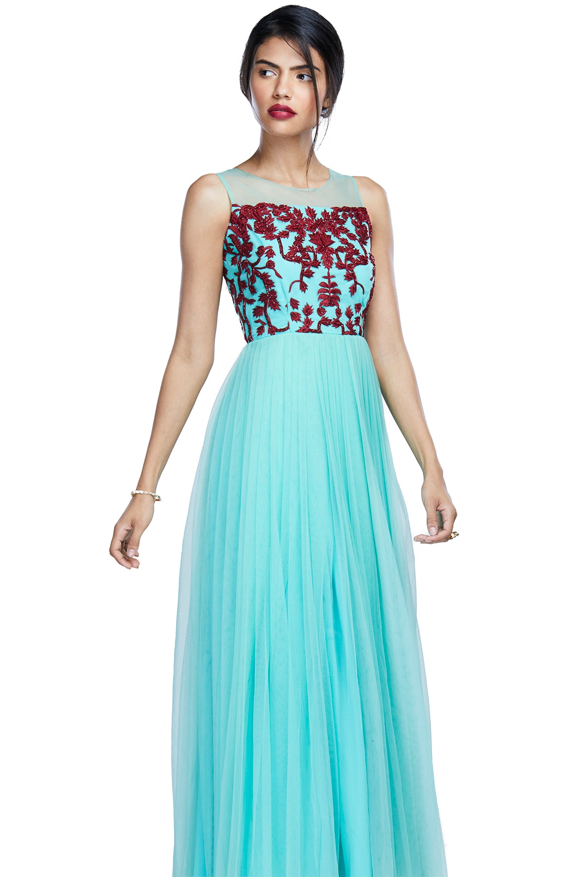 You're mint to stand out in this flouncy mint gown with a tinge of red embroidery to seal the deal. The outfit has a net bodice and plain tulle bottom. 