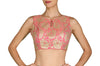 Double the celebrations in this pink and gold lace fabric blouse with slight in-cut sleeves and a keyhole cutout in the front and back.
